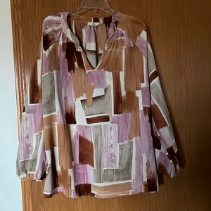 Beautiful blouse great for work environment
